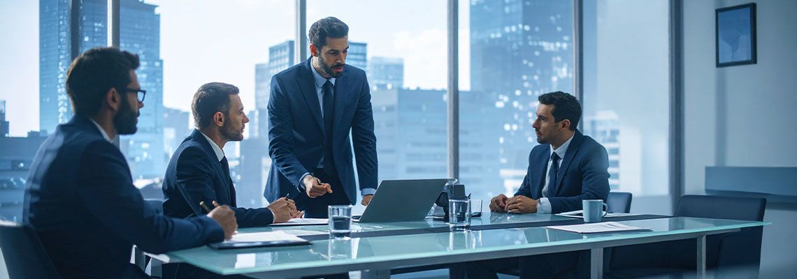 Discussion between shareholders in conference room