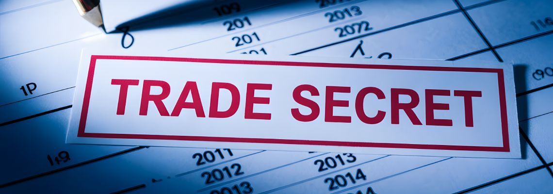 Confidential document marked with a red trade secret stamp
