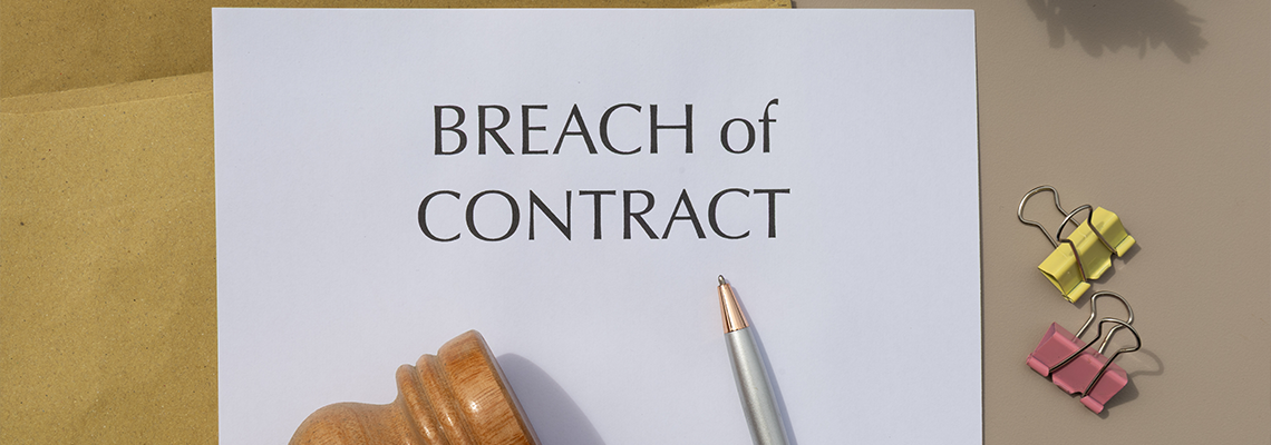 Legal Dispute Setup: Breach of Contract Document with Gavel and Pen