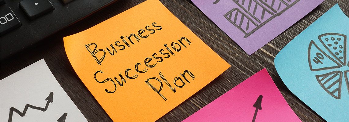 Business Succession Plan written on paper