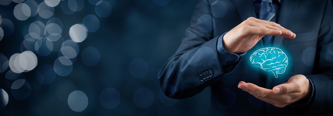 Man holding brain hologram in hand