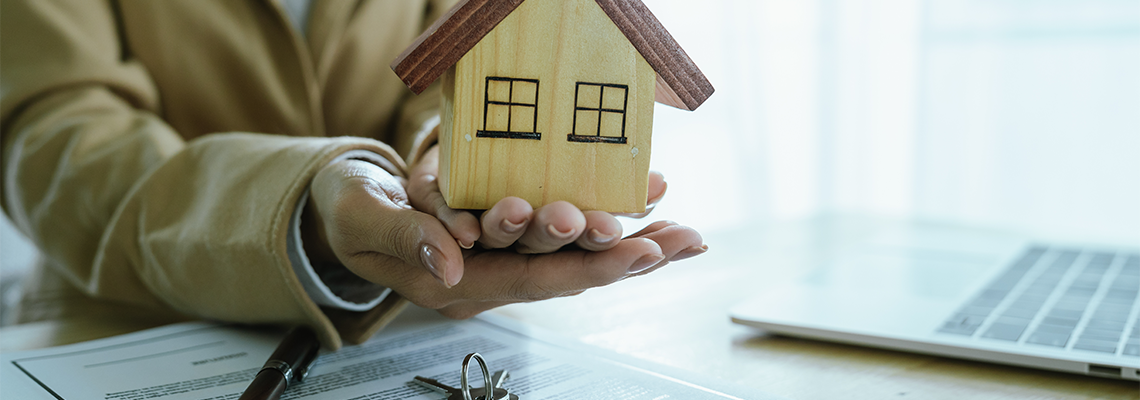 The real estate sales agent will hand over the keys and sign the contract