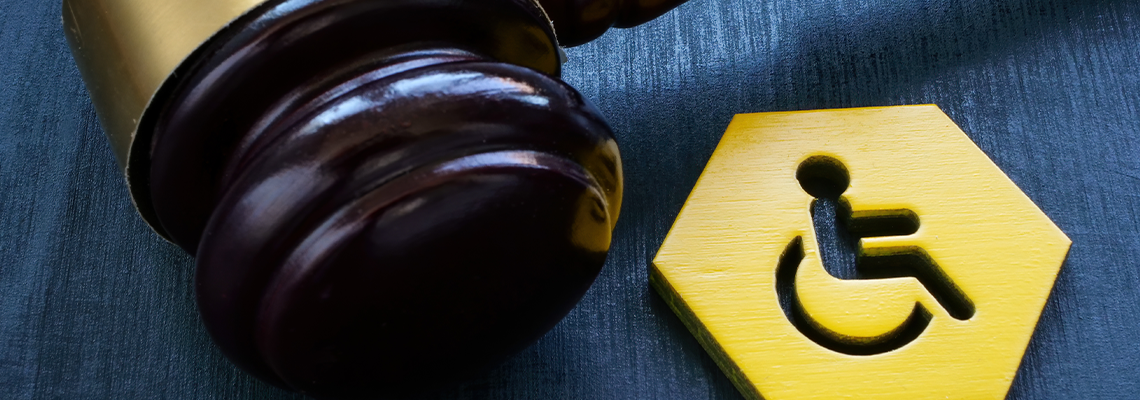 Gavel as symbol of law and disability person sign