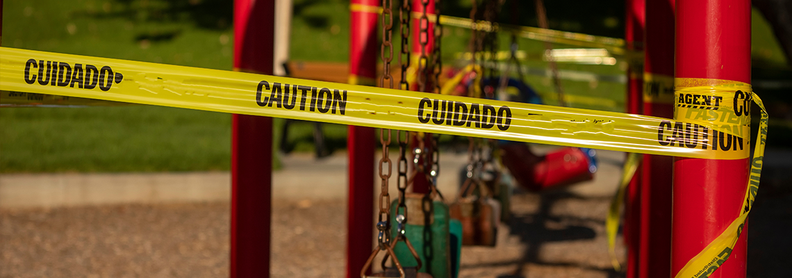 Playground_swing_set_with_caution.2e16d0ba.fill-1140x400