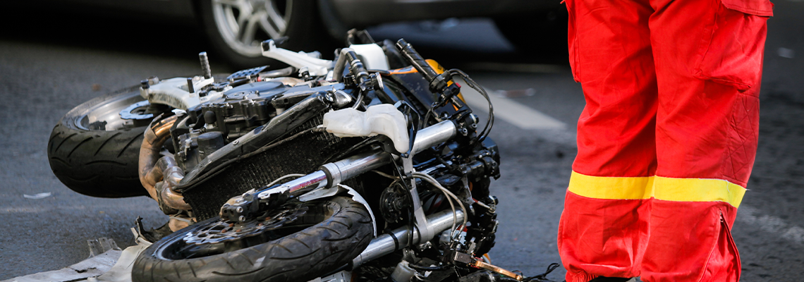 Crashed motorcycle in the street