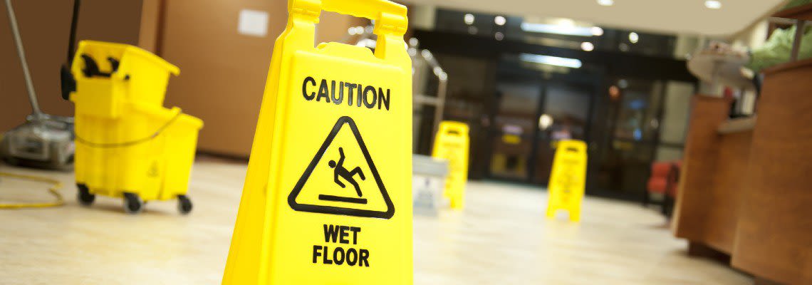 Caution wet sign in a hotel lobby