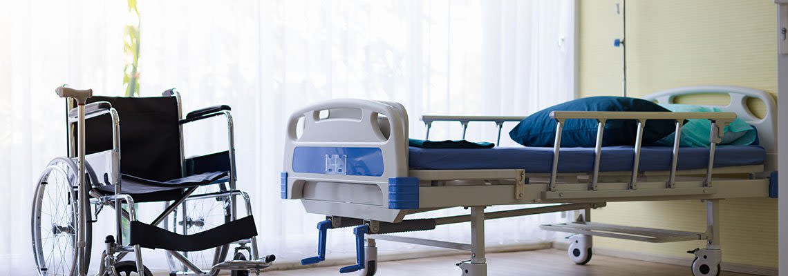 Nursing home bed and wheelchair