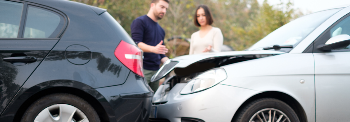 People Checking Car Damages After Car Accident