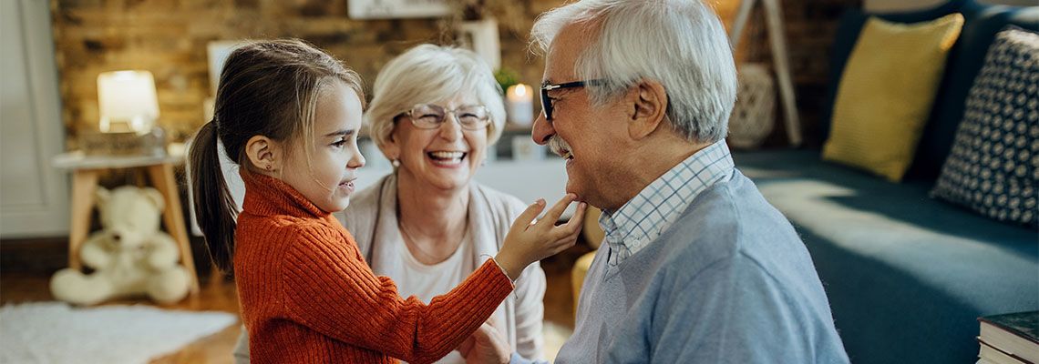 Little child enjoying her time with grand parents