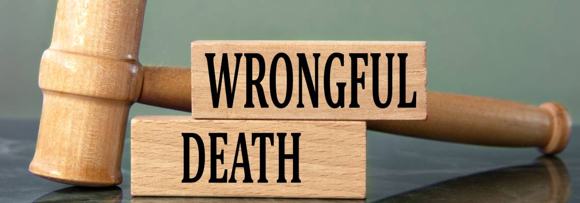 WRONGFUL DEATH words on wooden blocks with gavel