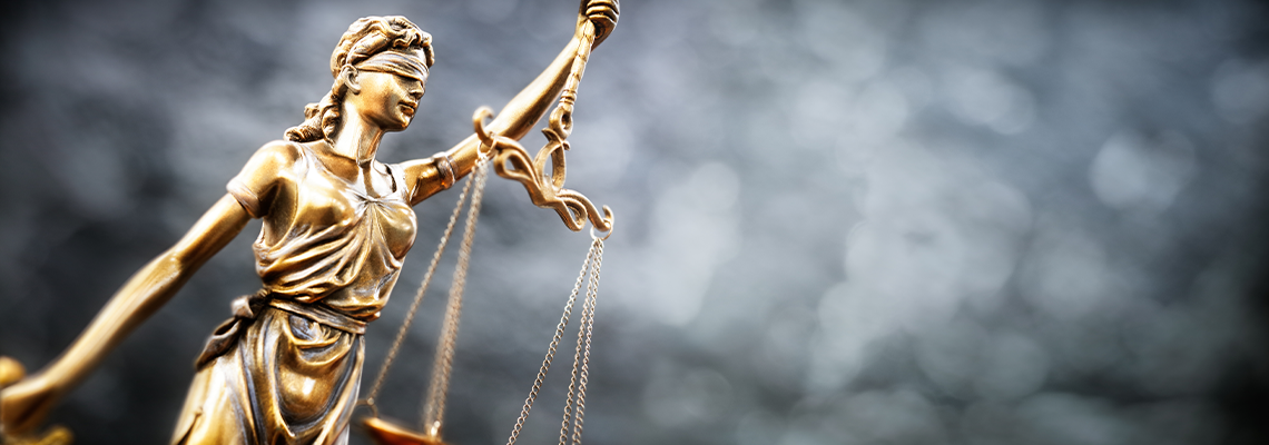 statue of Lady Justice with scales of justice