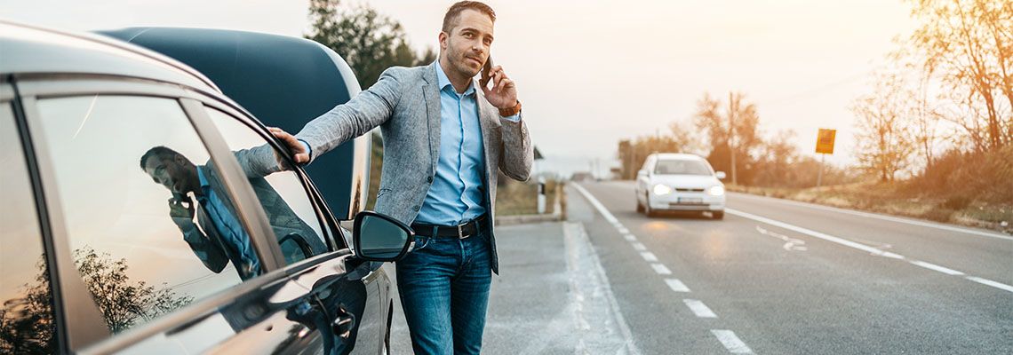 Man calling for help on road after car breaks down