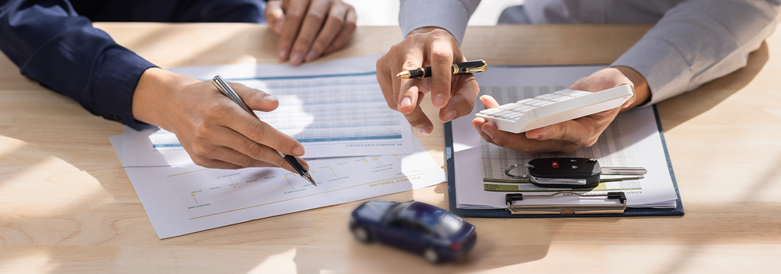 Car Insurance document or lease concept the car broker assisting his customer