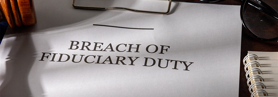 Breach of Fiduciary Duty Legal Form in Clipboard on Office Desk