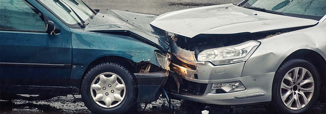 Head on collision between two cars