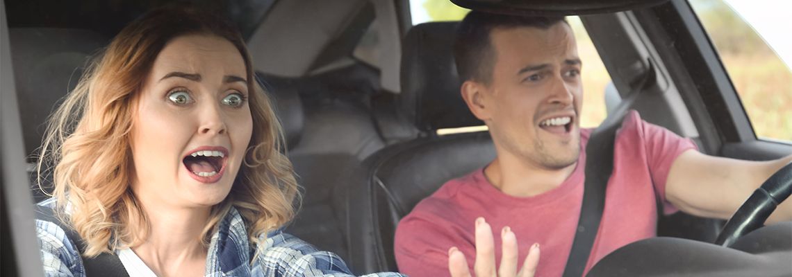 Panicked man and women before car accident