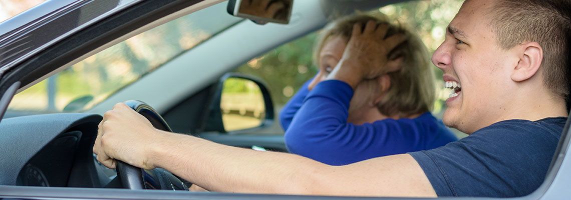 Driver and Passenger bracing for car accident impact