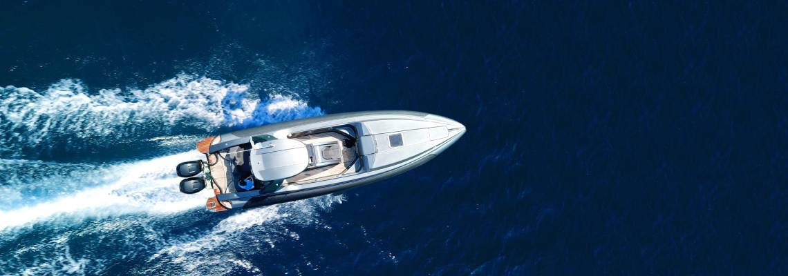Aerial drone top view of speed boating