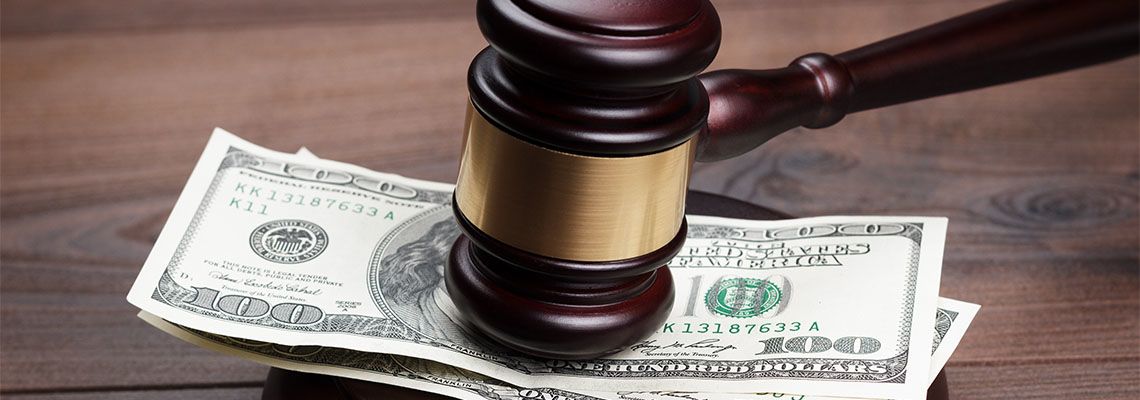 Gavel and Money in table