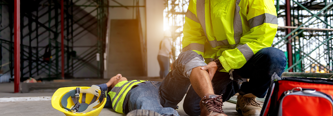 First Aid Support Accident at Work of Construction Worker at Site