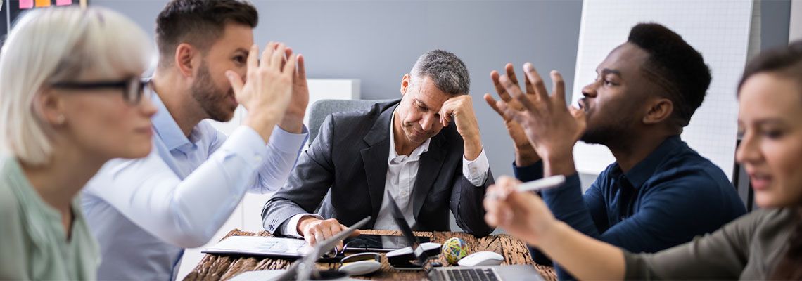 Business People Arguing In Meeting