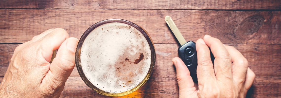 Man Hand Drinking Beer and Holding Car Keys