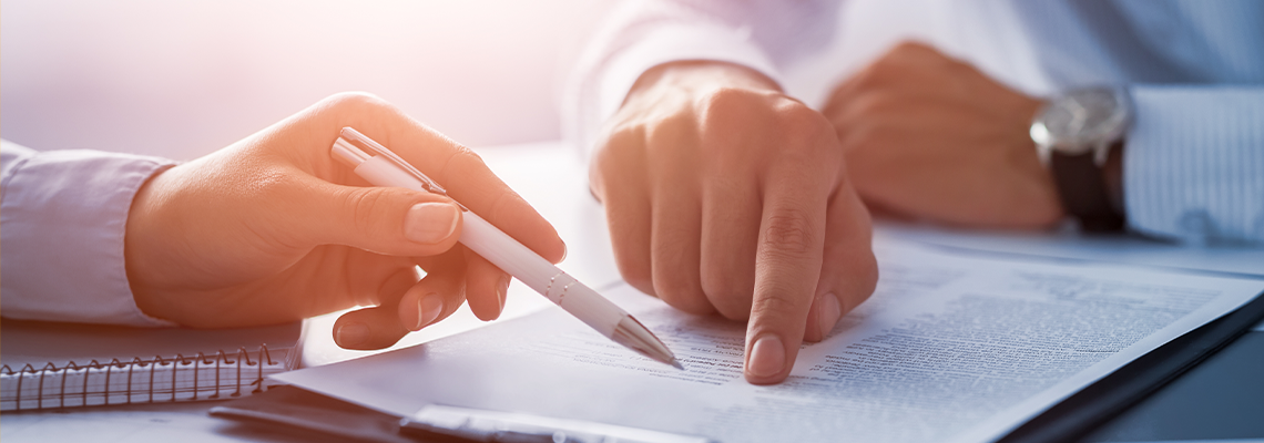Business People Negotiating a Contract