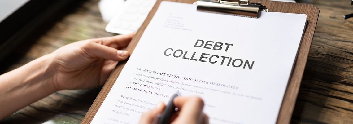 Women preparing Debt Collection Letter