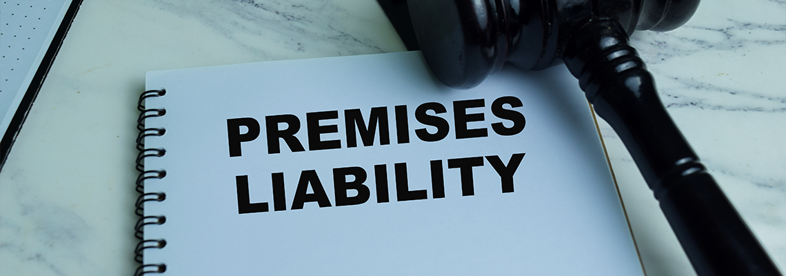 Concept of Premises Liability write on book with gavel