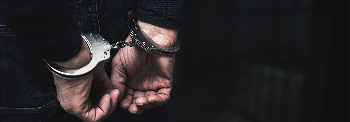 Handcuffed hands of a man