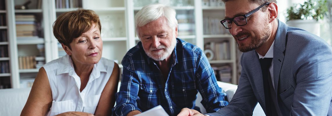 Old couples preparing estate plan with attorney