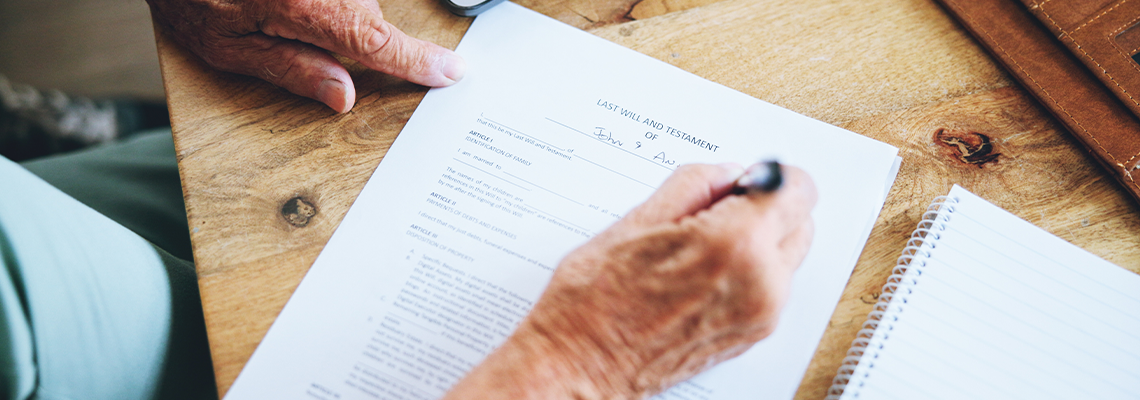 Hands, writing and document for will in home with information, reading and security for assets in death
