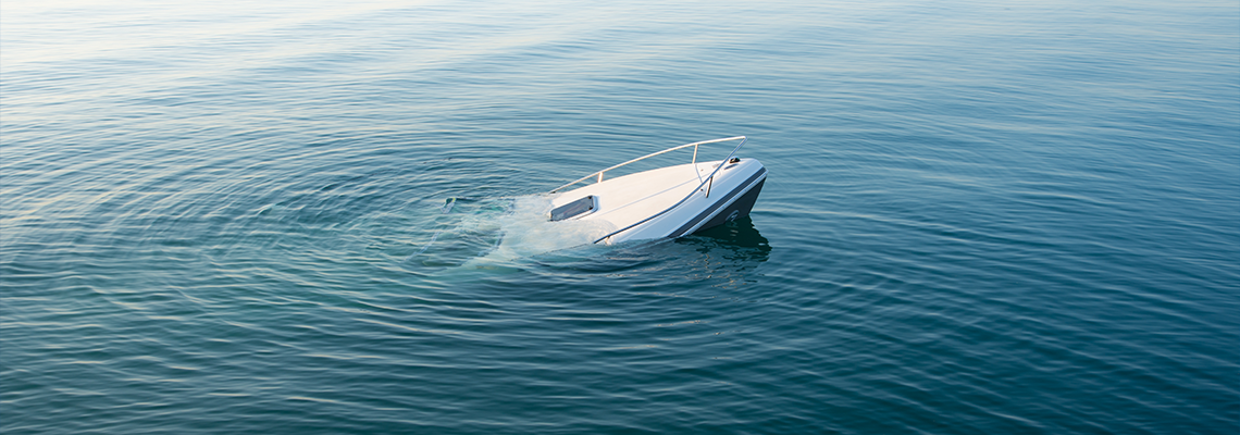 Sinking modern large white boat goes underwater