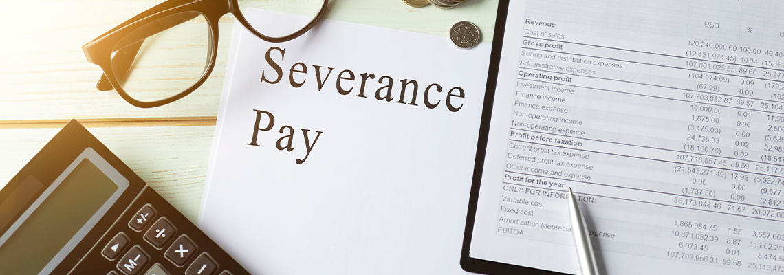 Paper with Severance Pay on a table