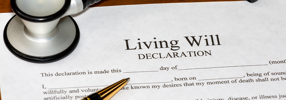 Living Will declaration form with stethoscope and ballpoint pen