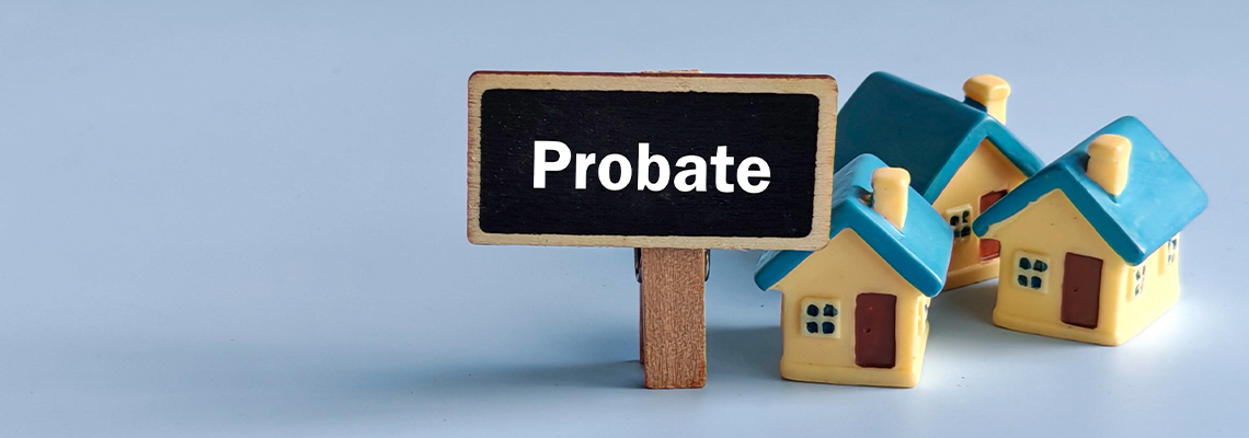 Probate concept with house model on blue background