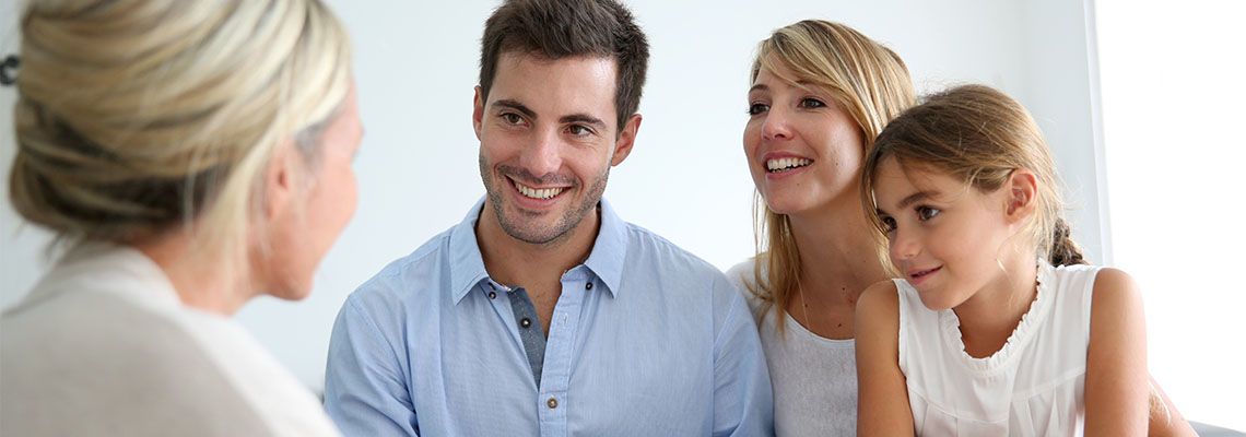 Family consulting with estate planning attorney