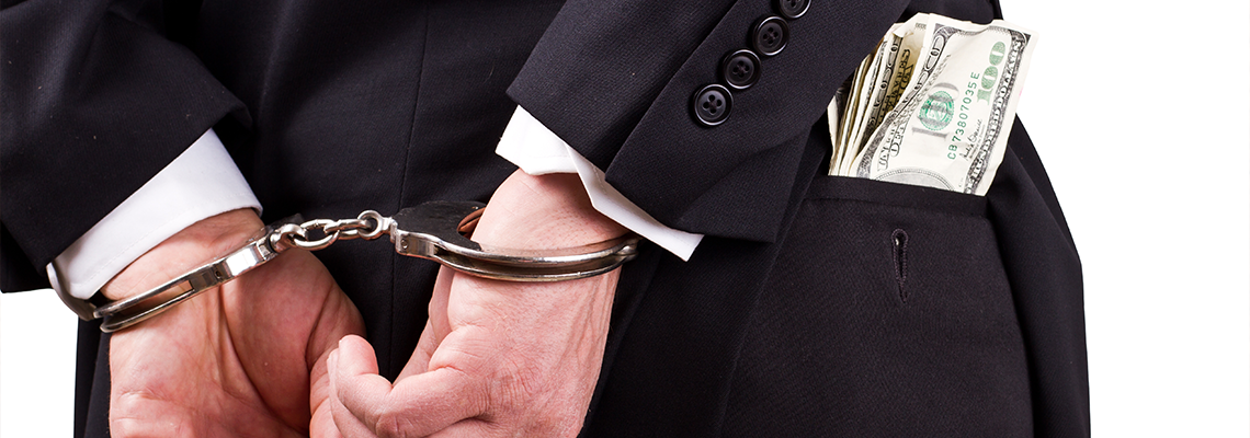 A person arrested due to white collar corruption