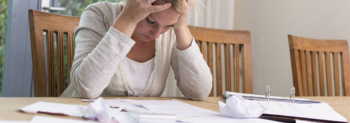 Frustrated women trying to manage debt