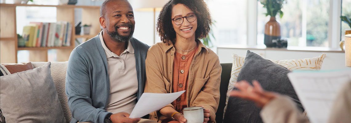 Couples discussing estate planning options with attorney