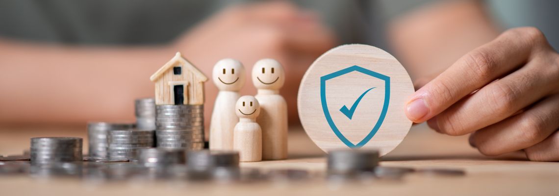 Hands holding shield icon, concept of Asset protection