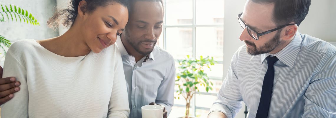 Couples consulting with attorney for estate planning