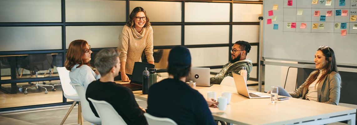 Business Team members in meeting room