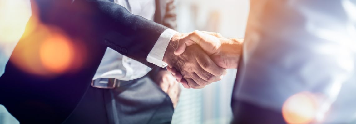 Businessman shaking hands after successful agreement