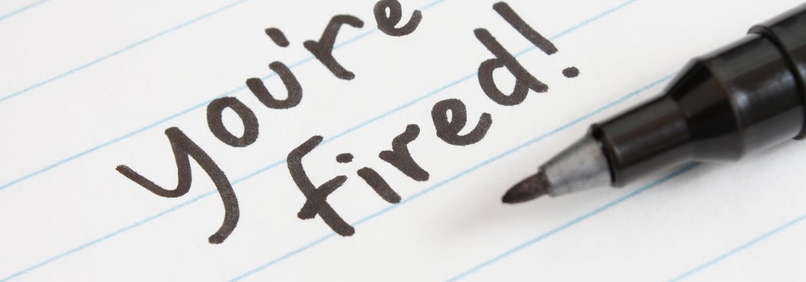 You're Fired! written in pen on a sheet of paper