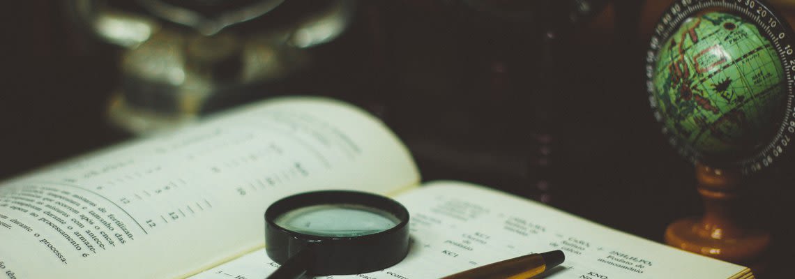 Magnifying glass on a book