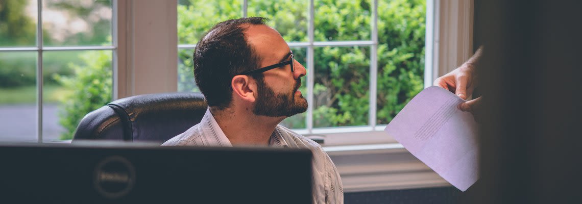 two men at a desk