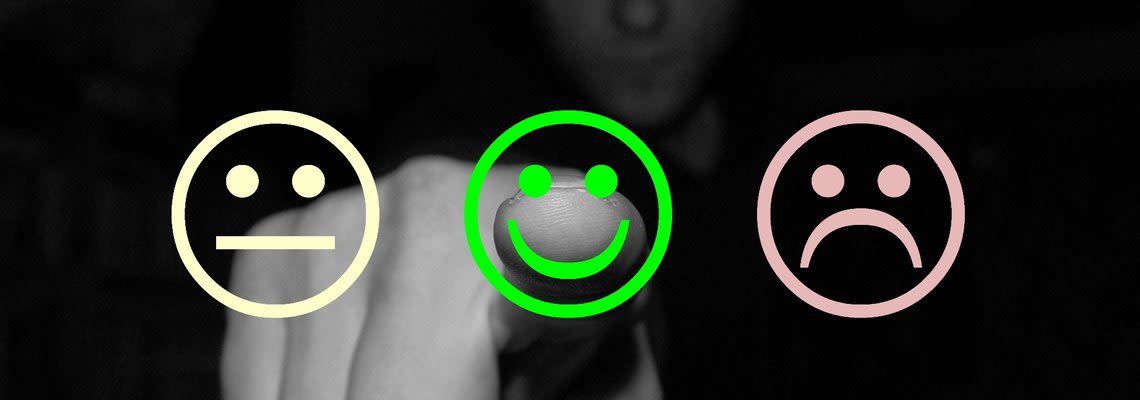 picking a smiling face over a sad or mad face