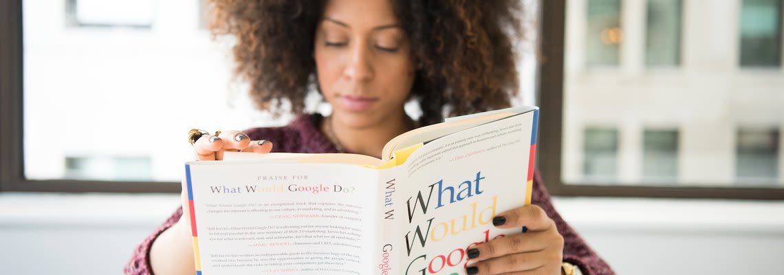 woman reading a google book