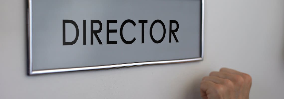 man knocking on director's door